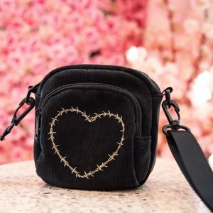 Cute black wired heart purse.